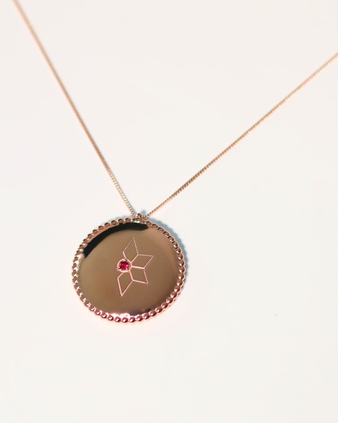 médaillon souvenir vermeil or rose rubis